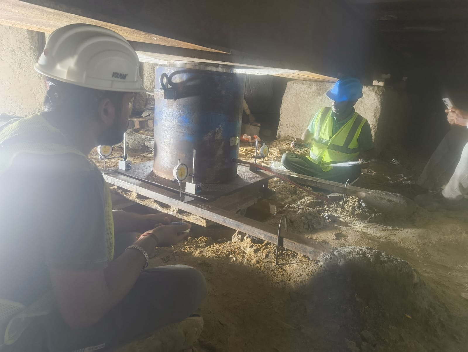 Falcon lab engineers conducting test under kentledge platform